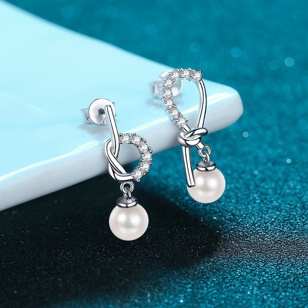 Boucles d'oreilles asymétriques en argent sterling 925 avec perle d'eau douce de 7 mm