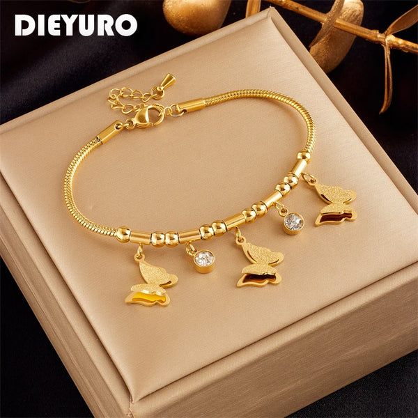 DIEYURO Bracelet à breloques papillon en acier inoxydable 316L avec zircon blanc pour femme,